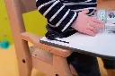 détail fauteuil tablette.webp