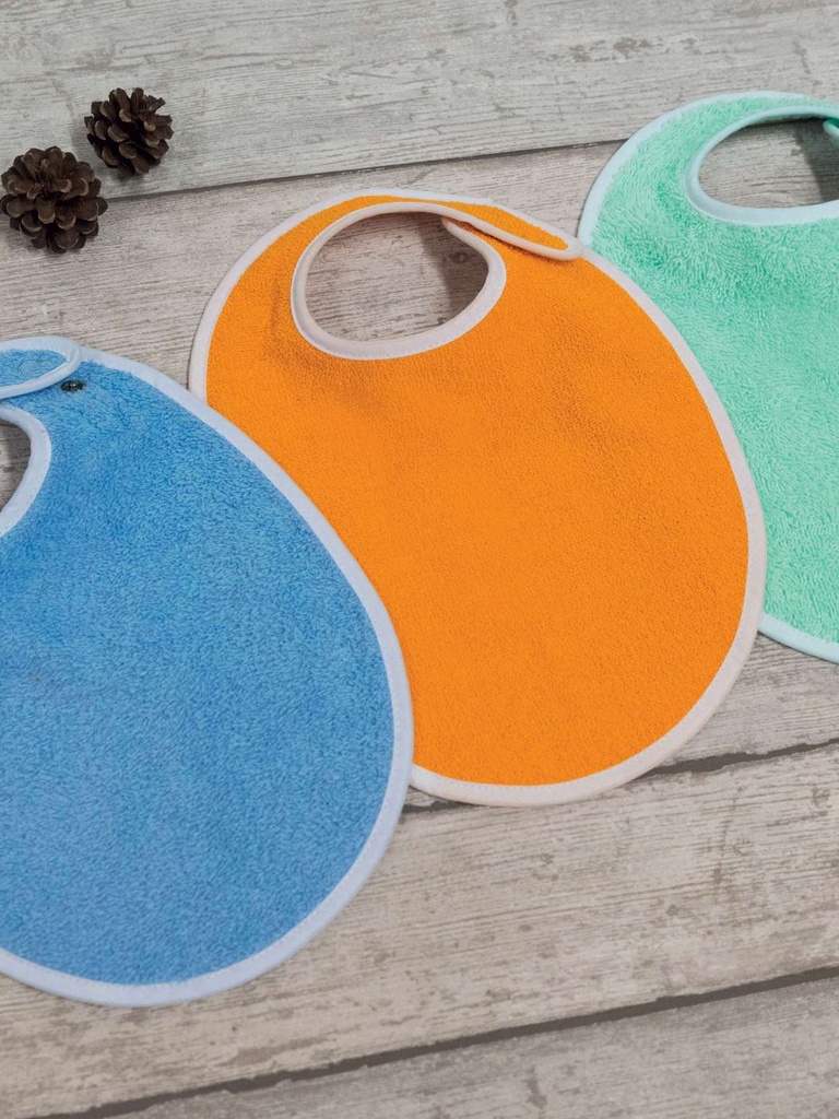 Bavoir uni ineffilochable avec pressions, dimensions 22x31 cm, lot de 10